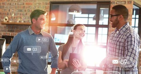 Professionals Engaged in Lively Discussion with Digital Notifications