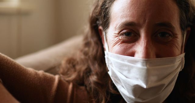 Smiling Woman Wearing Face Mask indoors - Download Free Stock Images Pikwizard.com