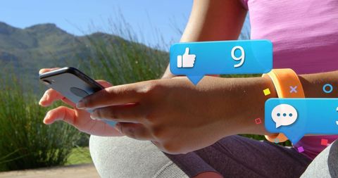 Person Engaging with Social Media on Smartphone with Notification Icons