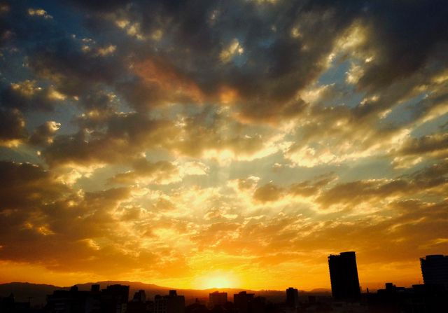 Golden Sunset Over Urban Skyline - Download Free Stock Photos Pikwizard.com