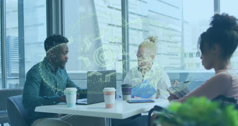 Diverse Team Collaborating with Cloud Technology Overlay in Modern Office