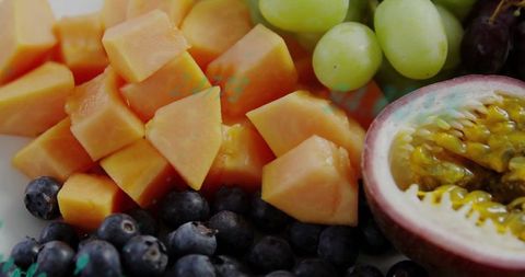 Vibrant Fresh Fruit Arrangement with Papaya Passionfruit