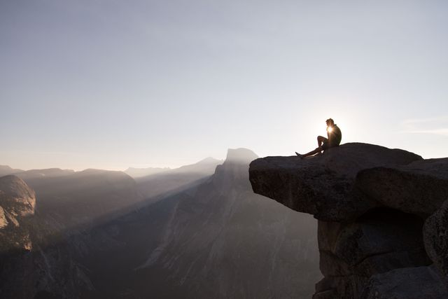 Hiker Enjoying Sunset on Mountain Ledge - Download Free Stock Images Pikwizard.com