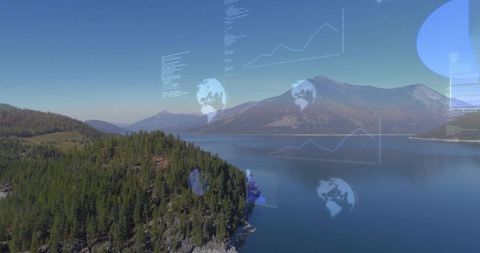 Aerial lake peninsula with pine forest, mountain range and futuristic digital data overlays