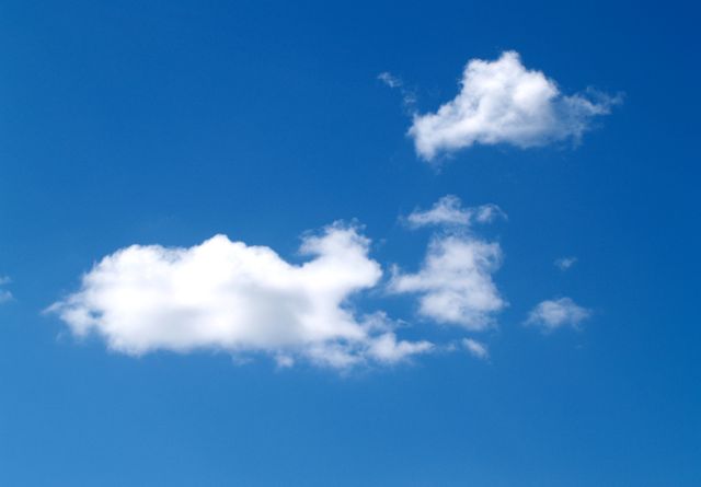 Fluffy White Clouds Floating in Clear Blue Sky - Download Free Stock Photos Pikwizard.com