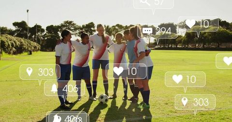 Women soccer team huddling on field showing social media reaction overlays