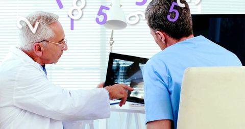 Doctors Analyzing Medical X-ray with Futuristic Technology