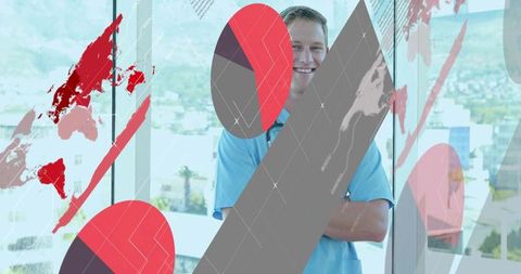 Smiling medical professional standing in modern clinic with graphic glass decals