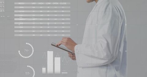 Doctor Using Digital Tablet with Medical Data Visualization