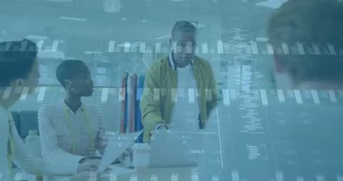 Office Team Analyzing Data Trends with Digital Charts Overlay