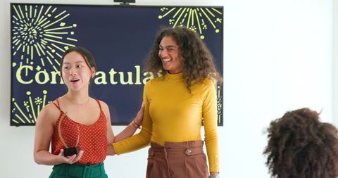 Colleagues Celebrating Success in Office Award Ceremony