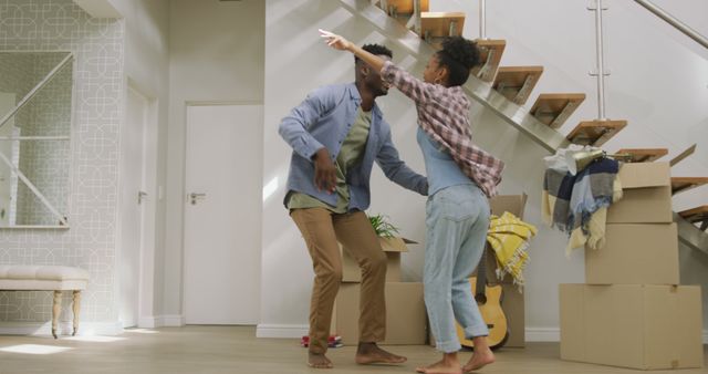 Image of happy african american couple embracing after moving into new house - Download Free Stock Photos Pikwizard.com