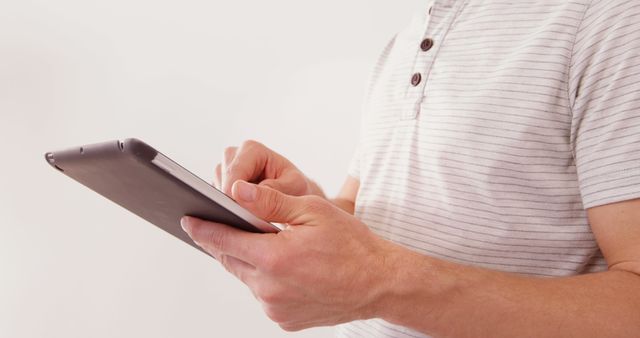 Person Using Tablet Device in Casual Attire - Download Free Stock Images Pikwizard.com