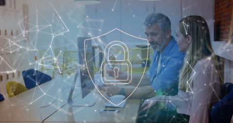 professionals collaborating on cybersecurity data with technology overlay - Download Free Stock Images Pikwizard.com