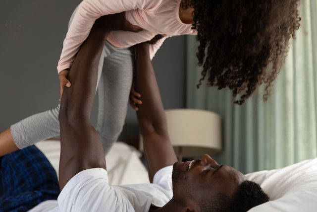 Father and Daughter Playing Together in Bedroom - Download Free Stock Images Pikwizard.com