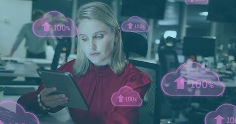 Businesswoman Managing Data Cloud Upload on Tablet