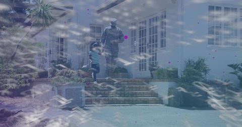 Uniformed soldier guiding young child up brick steps at home, military family reunion