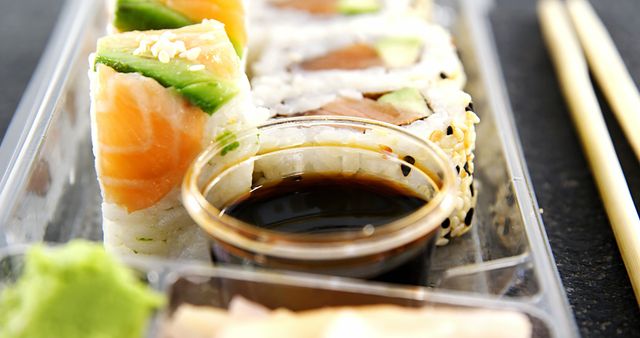 Sushi Rolls with Soy Sauce and Chopsticks - Download Free Stock Images Pikwizard.com