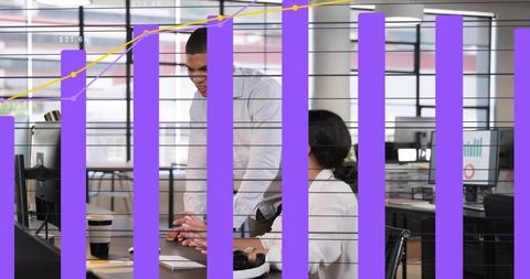 Collaborative business review showing rising analytics overlay on open office workstation