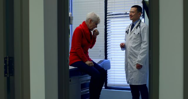 Doctor Consulting Elderly Woman in Medical Office - Download Free Stock Images Pikwizard.com