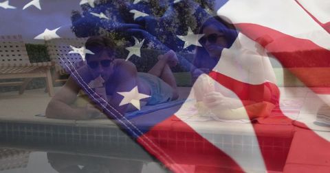 Couple relaxing poolside with patriotic overlay