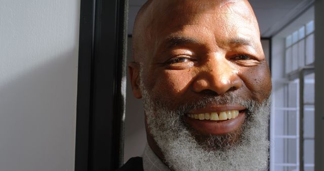 Smiling Senior Man with Graying Beard under Sunlight - Download Free Stock Images Pikwizard.com