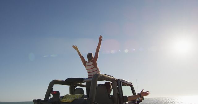 Joyful Road Trip Adventure in Convertible by the Ocean - Download Free Stock Images Pikwizard.com