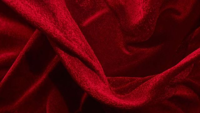 Luxurious Deep Red Velvet Fabric with Rich Draping