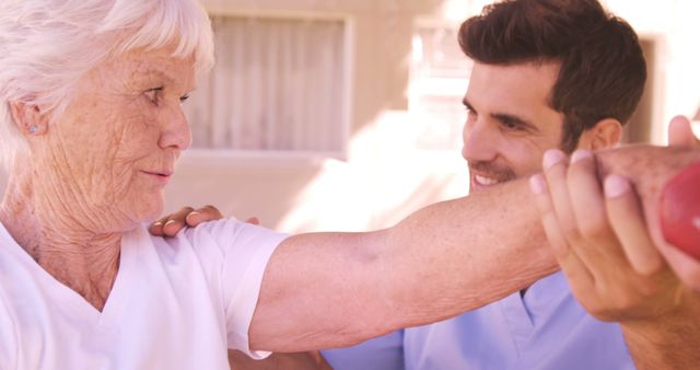 Senior Woman Exercising with Caregiver's Assistance Outdoors - Download Free Stock Images Pikwizard.com