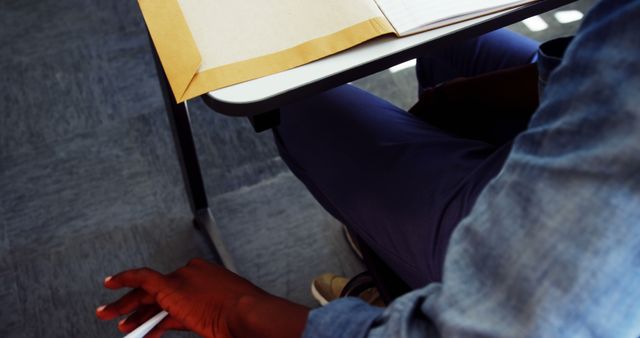 Student at Desk Writing Notes - Download Free Stock Images Pikwizard.com