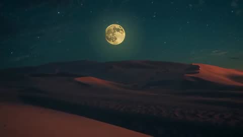 Full Moon Shining Over Desert Dunes with Starry Night Sky