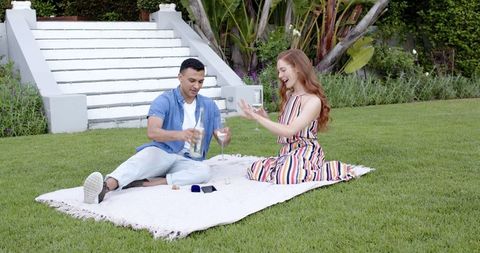 Romantic Garden Engagement with Champagne Celebration