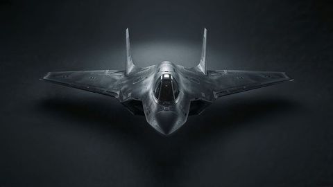 Stealth fighter jet hovering display in futuristic studio