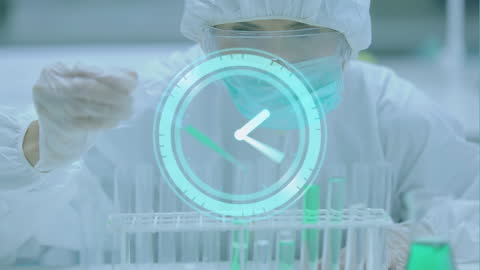 Scientist in Protective Gear Analyzing Samples in Bioengineering Lab