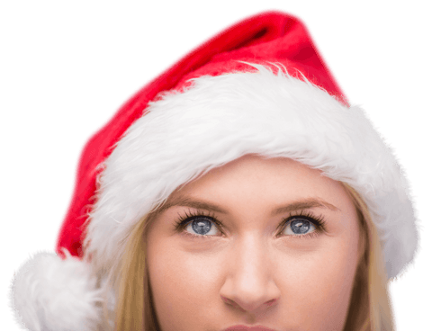 Festive Blonde Wearing Santa Hat Looking Up with Transparent Background