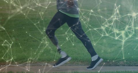 Athlete with Prosthetic Leg Running in Futuristic Network Design