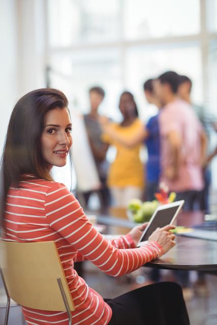 Portrait of businesswoman using tablet in conference room - Download Free Stock Images Pikwizard.com