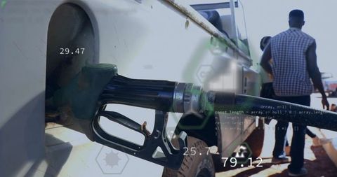 Refueling at station with green fuel nozzle and digital integration