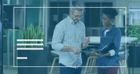 Coworkers Brainstorming in Modern Office Lounge