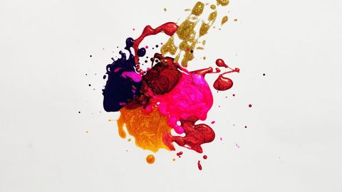 Colorful paint splatter on white background