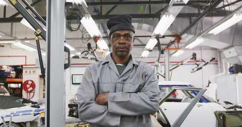 Confident Automotive Mechanic in Township Workshop - Download Free Stock Images Pikwizard.com