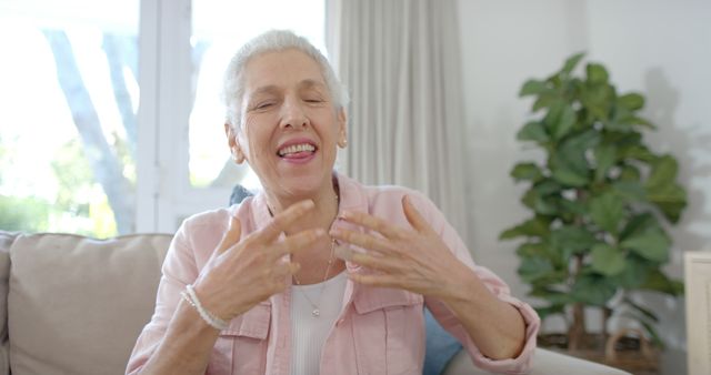 Senior Woman Enjoying Herself at Home, Laughing - Download Free Stock Images Pikwizard.com