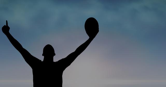 Digital composite of Silhouette man with arms raised holding rugby ball