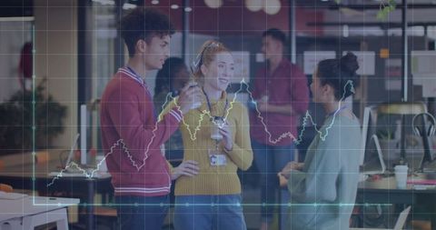 Young Professionals Discussing in Office with Financial Data Overlay