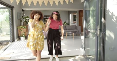 Cheerful Friends Celebrating Birthday on Terrace Outdoors