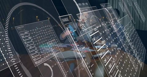 Business team collaborating with augmented reality financial dashboards in modern boardroom