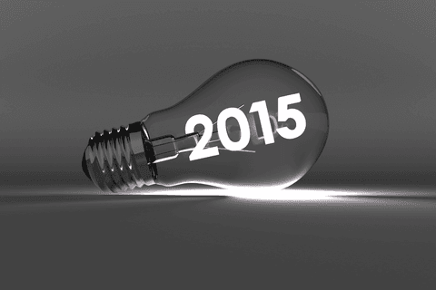 Transparent lightbulb with 2015 text for innovation concepts