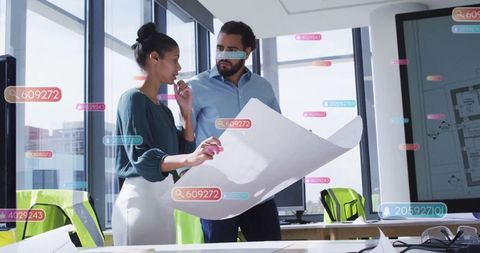 Architects Analyzing Blueprints with Interactive Digital Elements