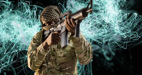 Focused Soldier with Innovative Light Trails in Combat Gear
