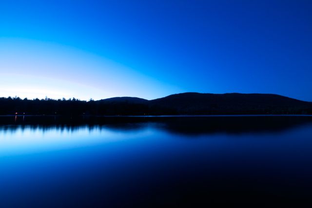 Calm Evening at a Peaceful Lake Under Twilight Sky - Download Free Stock Photos Pikwizard.com